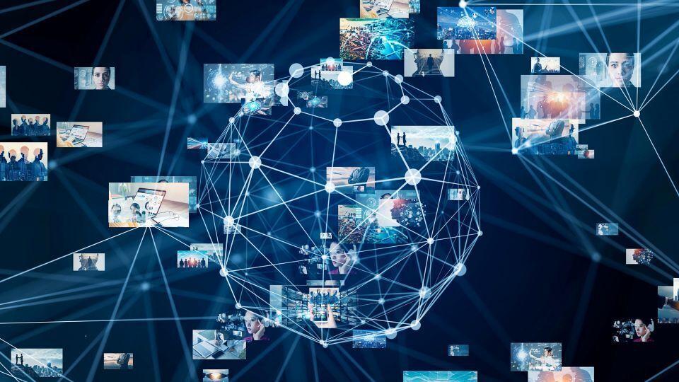A visualization of data and digital content networks, using white pinpoints on a dark blue background 