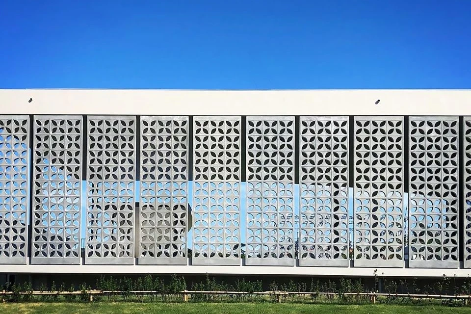 Amawari Park Historical and Cultural Facility in Okinawa, a building with an airy, flower-inspired exterior