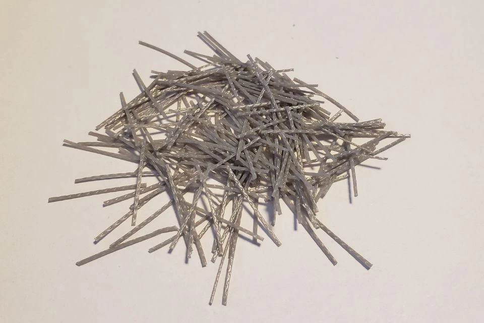 Polypropylene fibers on a flat white surface