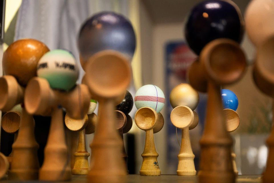 A variety of kendama, made in various materials and colors