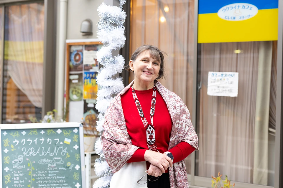 Natalya Kovalova, Chairperson of the Association of Friendship Ukraine-Japan NPO Kraiany, in front of the Kraiany Ukraine Cafe