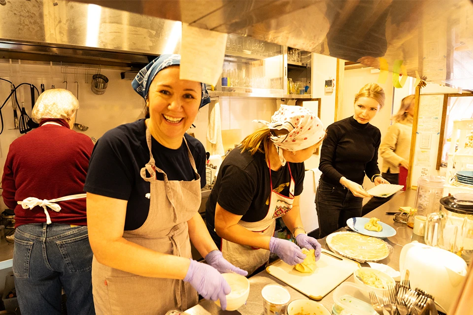 Four women working in the Ukrainian cafe Kraiany